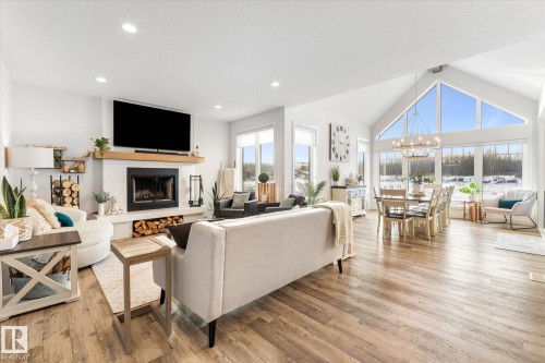 18 3410 Ste. Anne Trail, Rural Lac Ste. Anne County, AB - Indoor Photo Showing Living Room With Fireplace