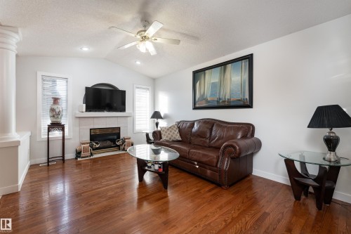 948 Ormsby Wynd, Edmonton, AB - Indoor Photo Showing Living Room With Fireplace