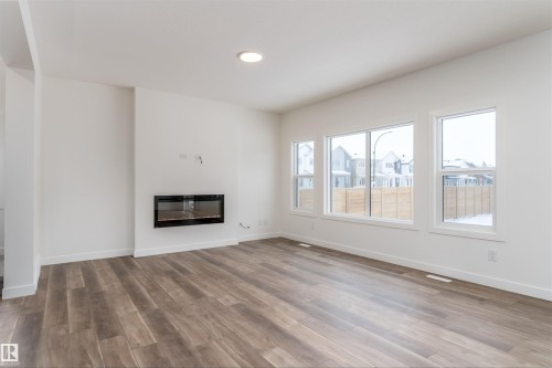 1 Empress Way, Spruce Grove, AB - Indoor Photo Showing Living Room With Fireplace