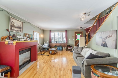 10207 88 Street, Edmonton, AB - Indoor Photo Showing Living Room With Fireplace