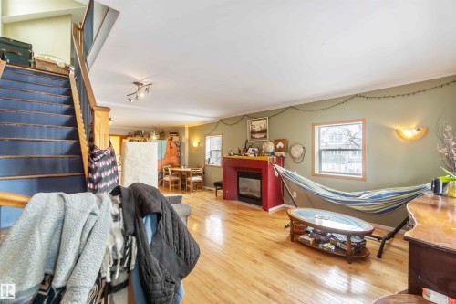 10207 88 Street, Edmonton, AB - Indoor Photo Showing Living Room With Fireplace