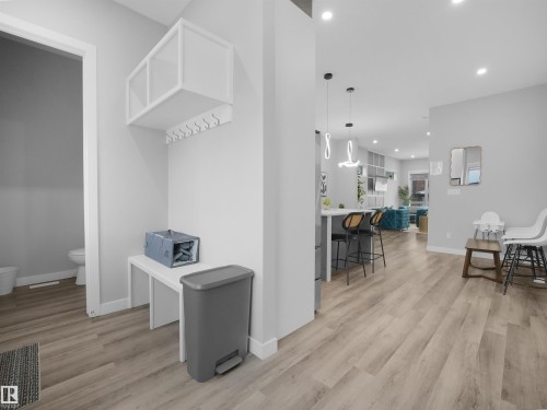 Hall with light wood-style floors and recessed lighting - 10911 159 Street, Edmonton, AB - Indoor Photo Showing Other Room