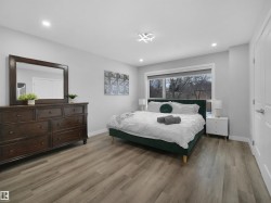 Bedroom featuring light wood-type flooring and recessed lighting - 