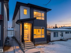 Modern home with entry steps and board and batten siding - 