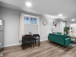 Living area featuring light wood-style floors and recessed lighting - 