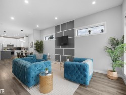 Living room featuring wood finished floors and recessed lighting - 