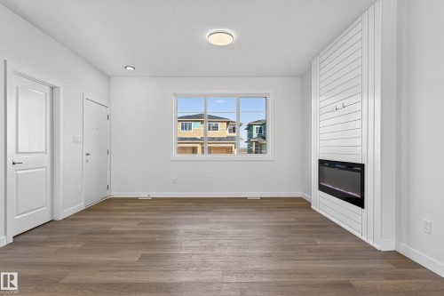 118 Pierwyck Loop, Spruce Grove, AB - Indoor Photo Showing Other Room With Fireplace