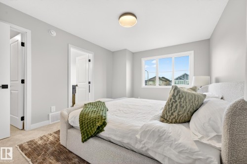 8233 Kiriak Loop, Edmonton, AB - Indoor Photo Showing Bedroom