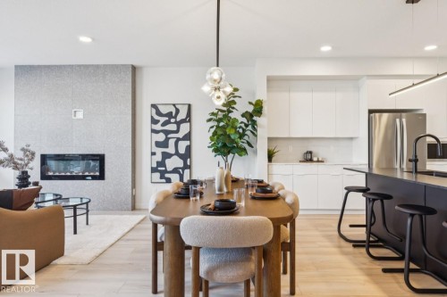 5105 69 Street, Beaumont, AB - Indoor Photo Showing Other Room With Fireplace