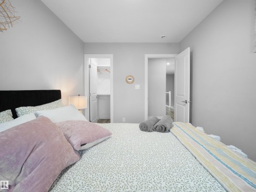 Bedroom with a spacious closet - 10913 159 Street, Edmonton, AB - Indoor Photo Showing Bedroom