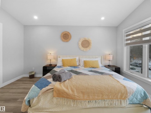 Bedroom featuring wood finished floors and recessed lighting - 10913 159 Street, Edmonton, AB - Indoor Photo Showing Bedroom