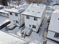 Snowy aerial view with a residential view - 