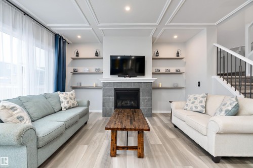 211 Caledon Crescent, Spruce Grove, AB - Indoor Photo Showing Living Room With Fireplace