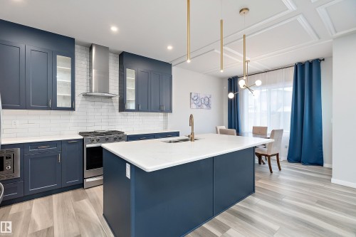211 Caledon Crescent, Spruce Grove, AB - Indoor Photo Showing Kitchen With Upgraded Kitchen