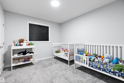 211 Caledon Crescent, Spruce Grove, AB - Indoor Photo Showing Bedroom