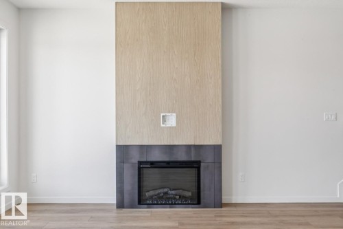 320 30 Street, Edmonton, AB - Indoor Photo Showing Living Room With Fireplace