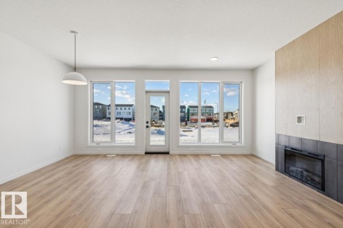 320 30 Street, Edmonton, AB - Indoor Photo Showing Other Room With Fireplace