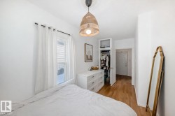 Bedroom with light wood-type flooring - 