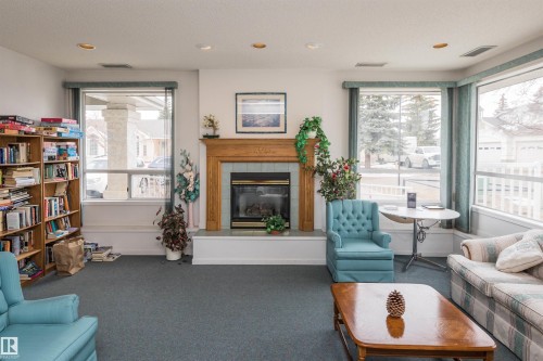 36 303 Twin Brooks Drive, Edmonton, AB - Indoor Photo Showing Living Room With Fireplace