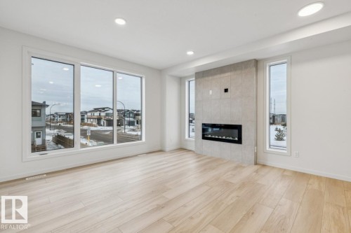 2604 Alces Way, Edmonton, AB - Indoor Photo Showing Living Room With Fireplace