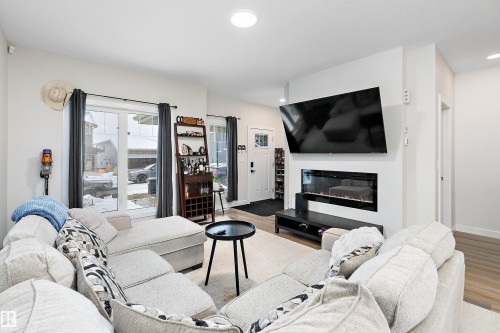 17 Emerald Way, Spruce Grove, AB - Indoor Photo Showing Living Room With Fireplace