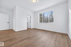 Unfurnished bedroom featuring light wood-style floors - 