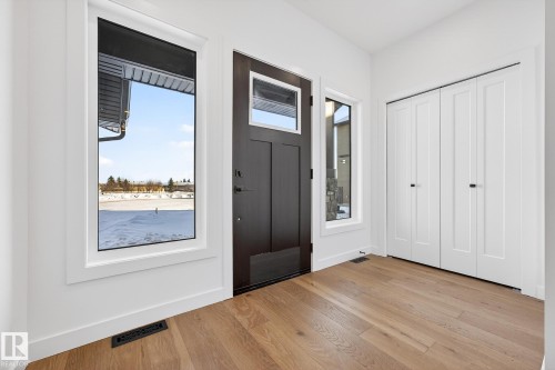 Foyer featuring light wood-type flooring - 132 Heron Point Close, Rural Wetaskiwin County, AB - Indoor Photo Showing Other Room