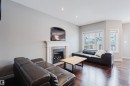 3921 167A Avenue, Edmonton, AB  - Indoor Photo Showing Living Room With Fireplace 