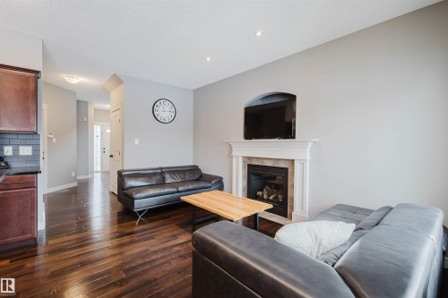 3921 167A Avenue, Edmonton, AB - Indoor Photo Showing Living Room With Fireplace