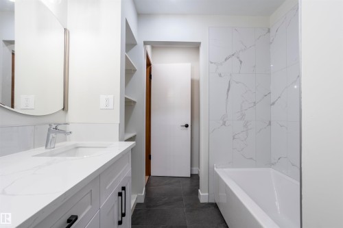 Full bathroom featuring vanity and shower / bath combination - 47 Manor Drive, Sherwood Park, AB - Indoor Photo Showing Bathroom