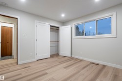 Unfurnished bedroom with light wood-style flooring and a closet - 
