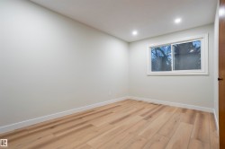 Unfurnished room featuring light wood-style floors and recessed lighting - 