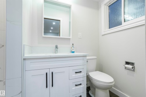 Bathroom featuring vanity and toilet - 47 Manor Drive, Sherwood Park, AB - Indoor Photo Showing Bathroom