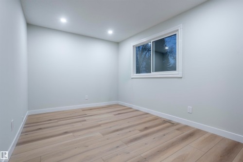 Spare room featuring light wood-style flooring and recessed lighting - 47 Manor Drive, Sherwood Park, AB - Indoor Photo Showing Other Room