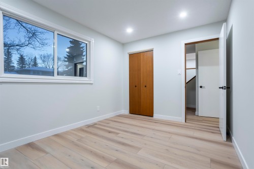 Unfurnished bedroom with light wood finished floors and a closet - 47 Manor Drive, Sherwood Park, AB - Indoor Photo Showing Other Room