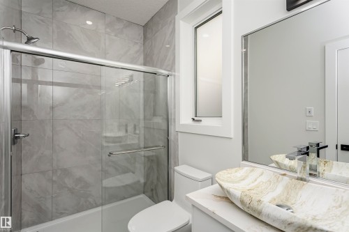 Full bathroom featuring vanity and a stall shower - 1723 19 Street, Edmonton, AB - Indoor Photo Showing Bathroom