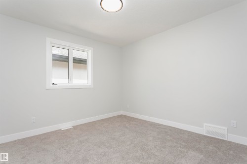 Unfurnished room with baseboards and carpet floors - 1723 19 Street, Edmonton, AB - Indoor Photo Showing Other Room
