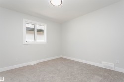 Unfurnished room with baseboards and carpet floors - 