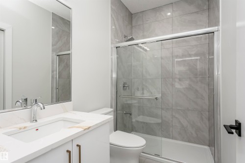 Bathroom featuring a stall shower and vanity - 1723 19 Street, Edmonton, AB - Indoor Photo Showing Bathroom