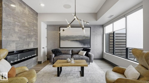 311 7463 May Common, Edmonton, AB - Indoor Photo Showing Living Room With Fireplace