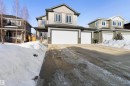 View of front of property with a garage and driveway - 107 Cresthaven Grove, Ardrossan, AB  - Outdoor With Facade 