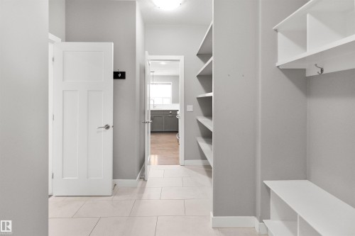 Spacious closet featuring light tile patterned floors - 107 Cresthaven Grove, Ardrossan, AB - Indoor