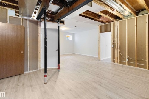 Unfinished below grade area with light wood-style flooring - 107 Cresthaven Grove, Ardrossan, AB - Indoor Photo Showing Basement