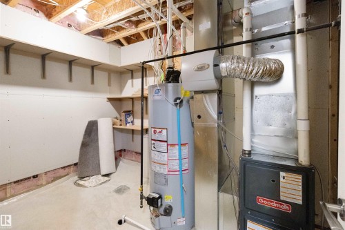 Utilities with gas water heater and heating unit - 107 Cresthaven Grove, Ardrossan, AB - Indoor Photo Showing Basement