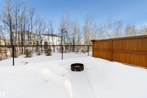 View of yard covered in snow - 107 Cresthaven Grove, Ardrossan, AB - Outdoor