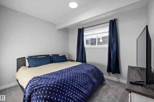 7027 54 Avenue, Beaumont, AB - Indoor Photo Showing Bedroom