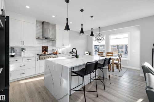7027 54 Avenue, Beaumont, AB - Indoor Photo Showing Kitchen With Upgraded Kitchen