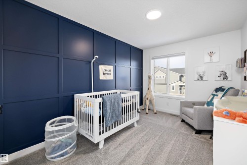 7027 54 Avenue, Beaumont, AB - Indoor Photo Showing Bedroom