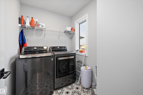 7027 54 Avenue, Beaumont, AB - Indoor Photo Showing Laundry Room