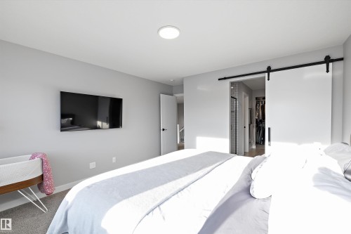 7027 54 Avenue, Beaumont, AB - Indoor Photo Showing Bedroom